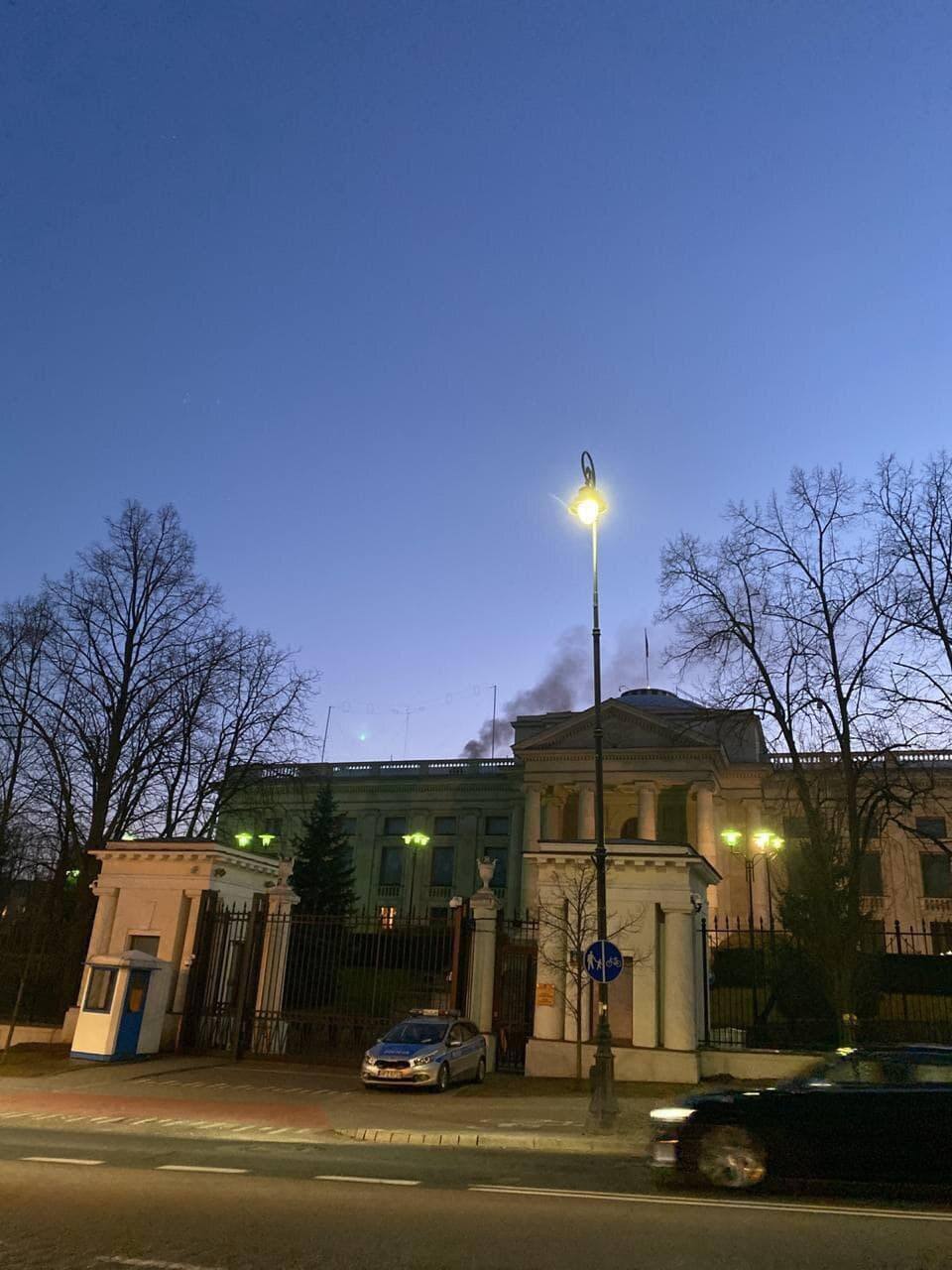 Smoke rises above the building of the Russian Embassy in Poland.